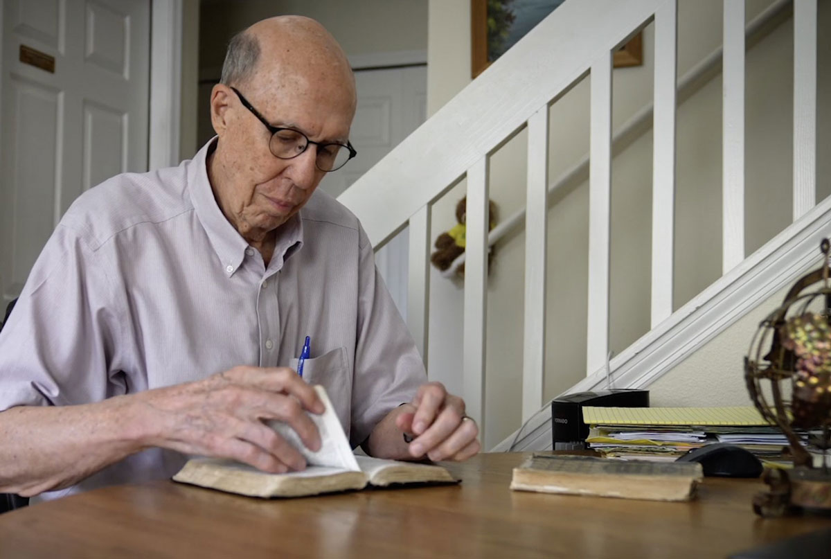 Steve Sheldon reading his Bible.